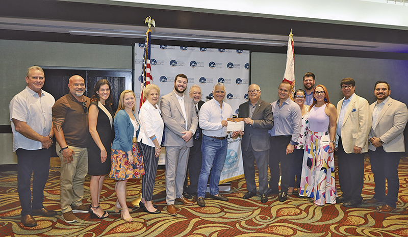 The Miami Lakes Chamber of Commerce held their monthly membership luncheon with guest speaker former City of Miami Chief of Police Jorge Colina