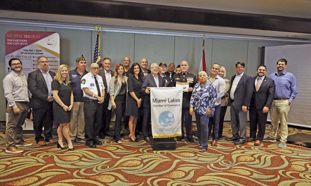 The Miami Lakes Chamber of Commerce hosted its monthly member luchon with a distinguished guest speaker, William Perez, a retired U.S. Marine Colonel and the chair of the Miami Lakes Veterans Committee.