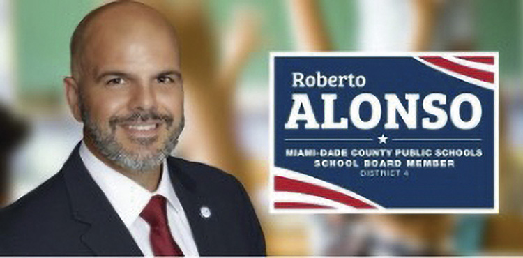 School Board member Roberto J. Alonso celebrates school board approval of two construction companies for gob projects totaling $37.5 million